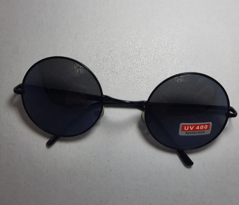 عینک آفتابی مدل شیشه گرد رنگ مشکی یووی 400