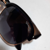 عینک آفتابی برند پرادا چهارگوش رنگ مشکی یووی 400 و پلاریزه